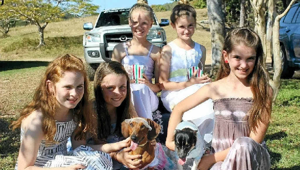 THE WEDDING PARTY: (From left) bridesmaid Ivy Dugdale, mother of the bride Lara Urwin and bride Bella, flowergirls Allie Salter and Lily Bromilow, groom Archie and bridesmaid Lillie Crumblin. THE WEDDING PARTY: (From left) bridesmaid Ivy Dugdale, mother of the bride Lara Urwin and bride Bella, flowergirls Allie Salter and Lily Bromilow, groom Archie and bridesmaid Lillie Crumblin.